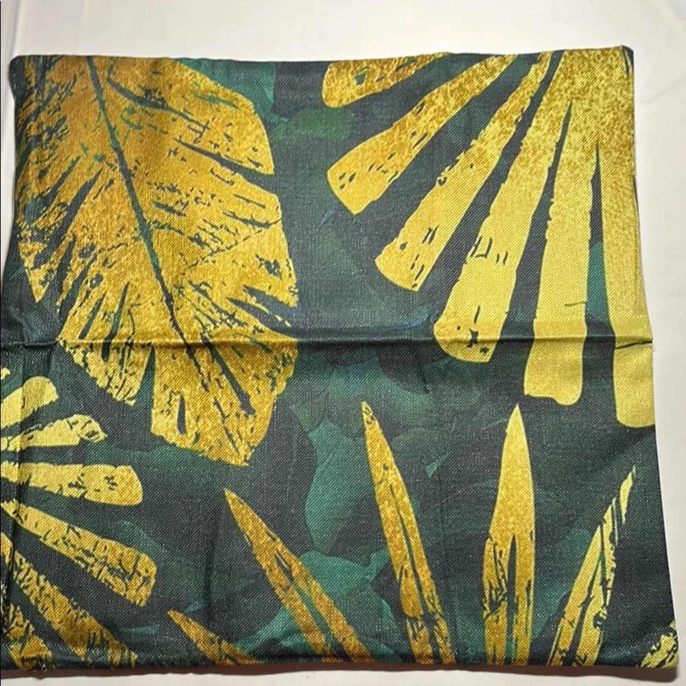 Floral Patterned outdoor waterproof throw pillow with Blue and Yellow Leaves.